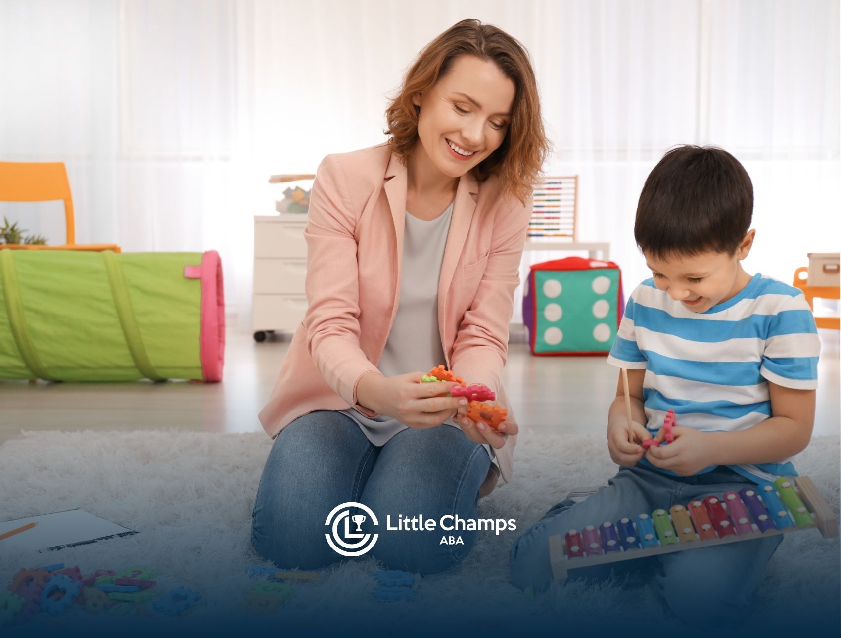 A woman and a child engaged in play with various toys in a bright, inviting room.