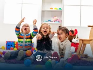 A group of children playing with colorful balls.