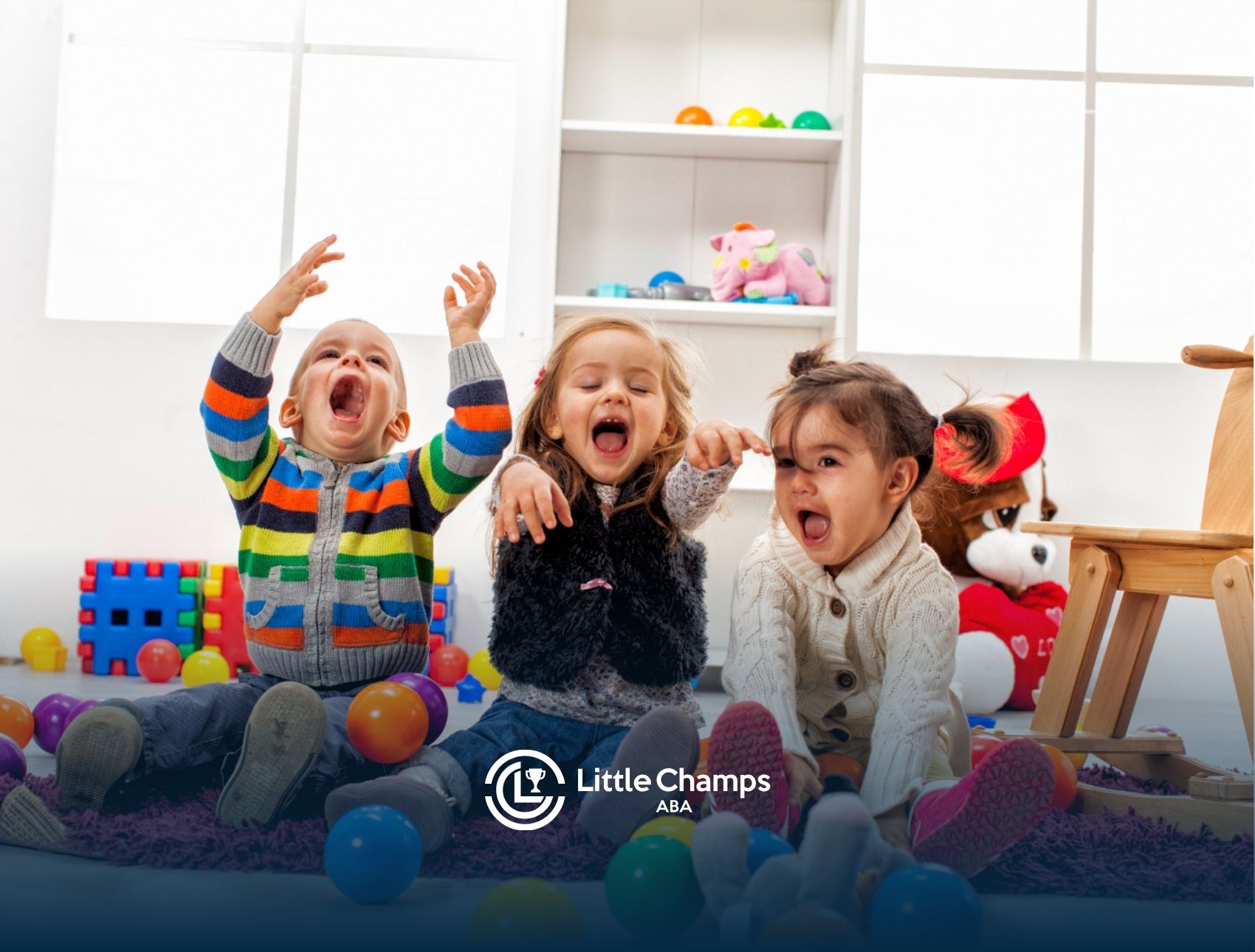 A group of children playing with colorful balls.