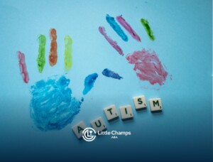 Colorful painted handprints and the word "AUTISM" spelled out on a blue background in Utah.