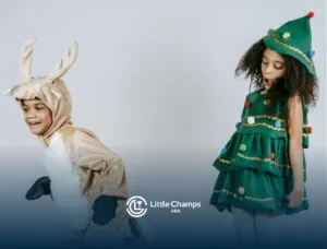 Two autistic children in festive costumes, one as a reindeer and the other as a Christmas tree in UT.