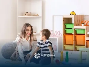 An ABA therapist with a little boy doing therapy in a home setting.