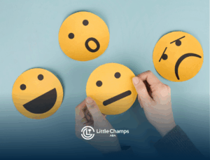 Four yellow paper circles with different facial expressions: happy, surprised, neutral, and sad.