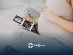 A pregnant woman is looking at her ultrasound