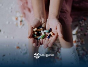 An autistic child holding colorful pills in their hands surrounded by scattered tablets in Colorado.