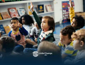 Children are raising their hands in a classroom