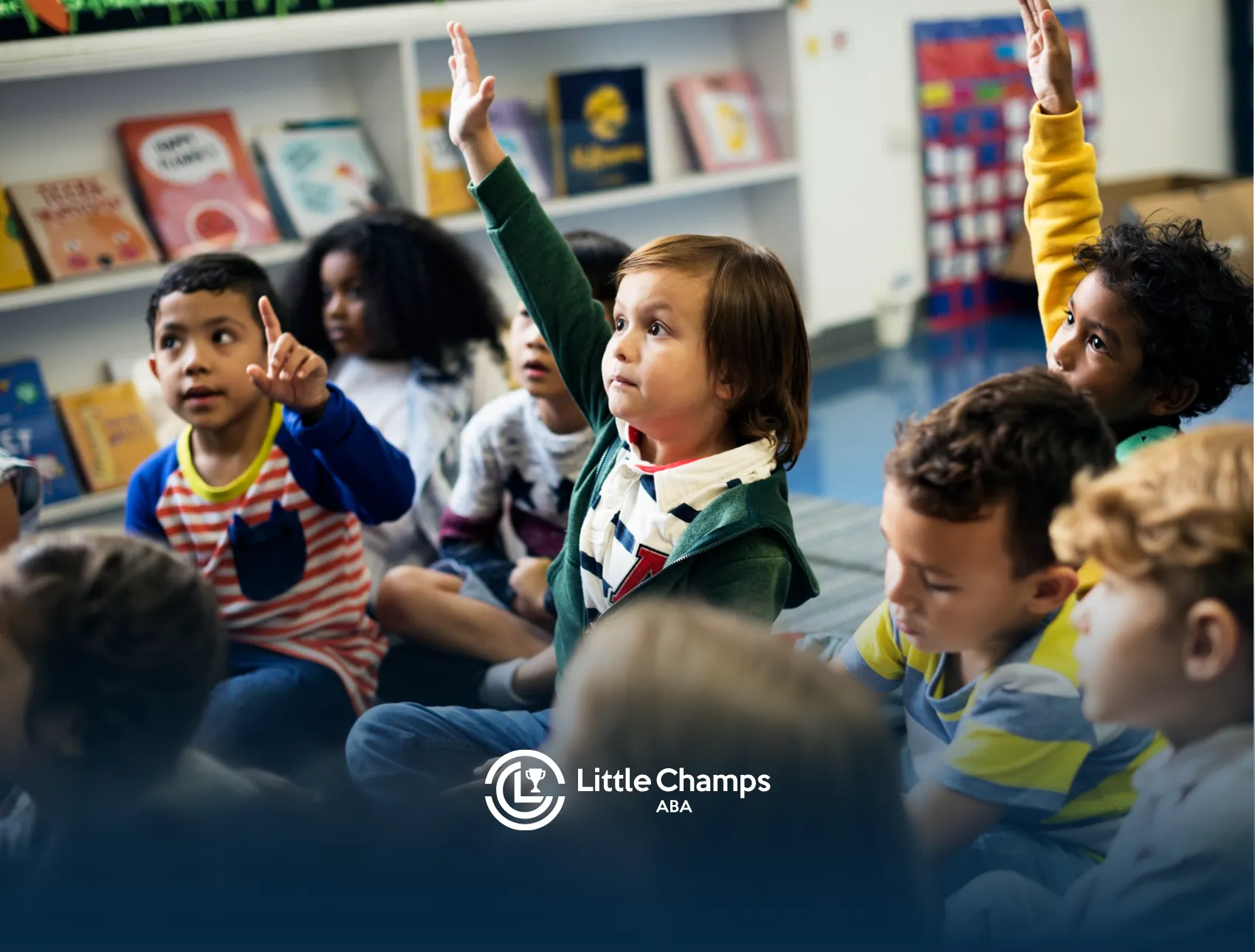 Children are raising their hands in a classroom
