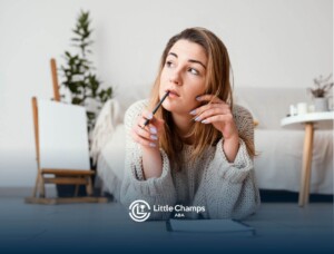 An autistic adult lying on the floor.