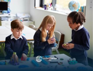 Three kids with autism in uniforms playing with building toys.