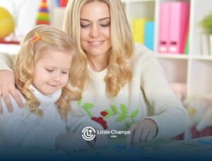 ABA therapist helping young girl with educational puzzle activity during ABA therapy.