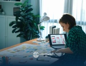 Young woman with autism working at desk with laptop and planning notes.