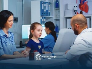 Mother and daughter speaking with doctor during autism evaluation.