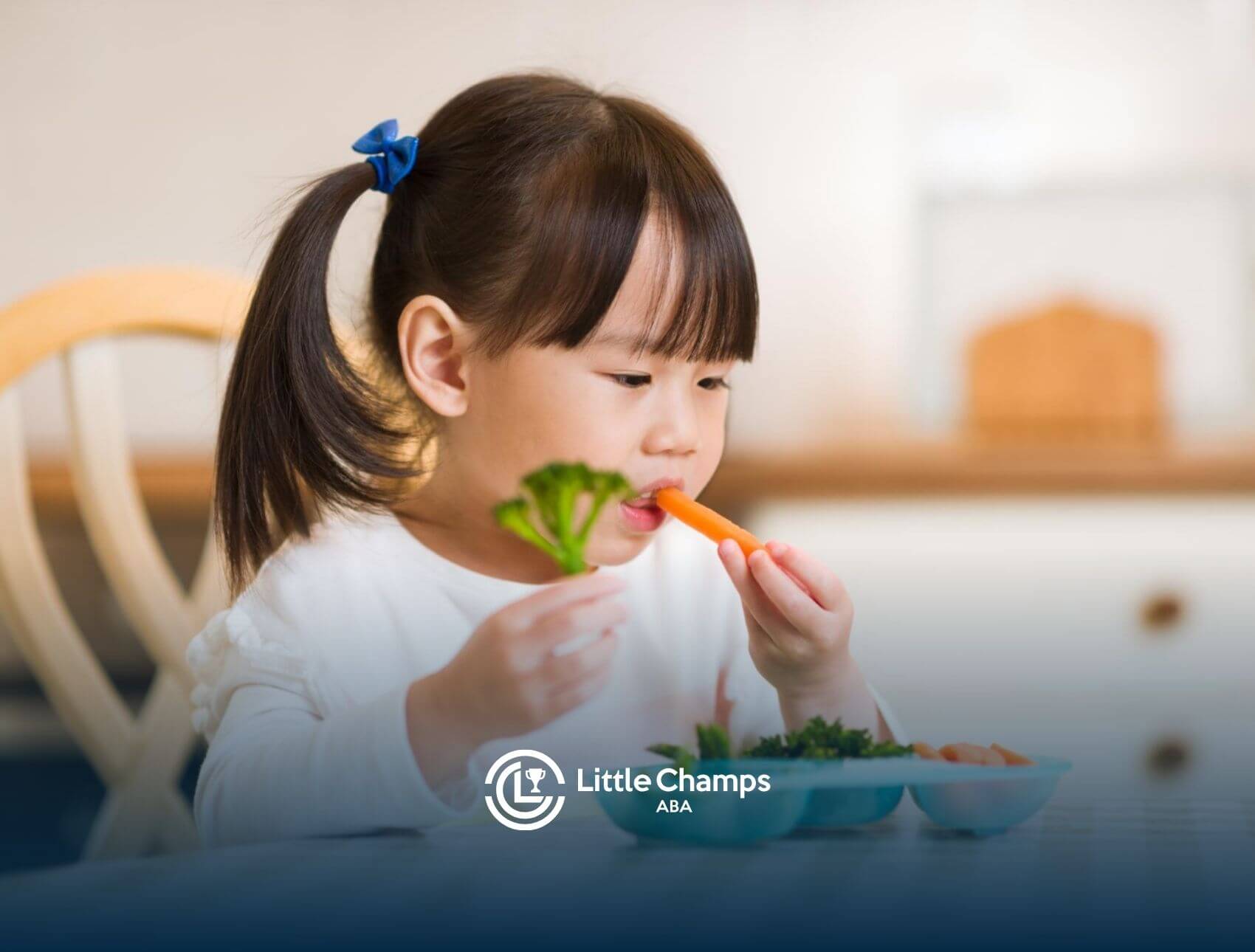 A child with autism eating vegetables at the table.