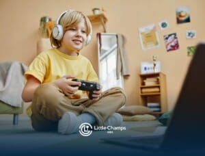 Boy with autism playing Minecraft on laptop.