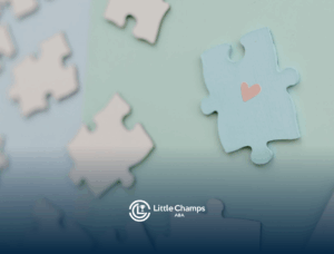 Puzzle pieces with one blue piece featuring a pink heart, symbolizing autism acceptance in Colorado.