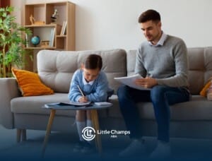 BCBA helping young girl with a task at a table in ABA therapy.