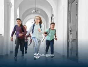 Group of school-age children with autism running down a bright hallway with backpacks.