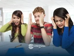 Three ABA students in an office space, all holding their heads and looking stressed or overwhelmed after the exam.