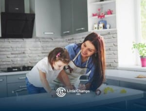 BCBA and girl with autism baking together in a bright kitchen.