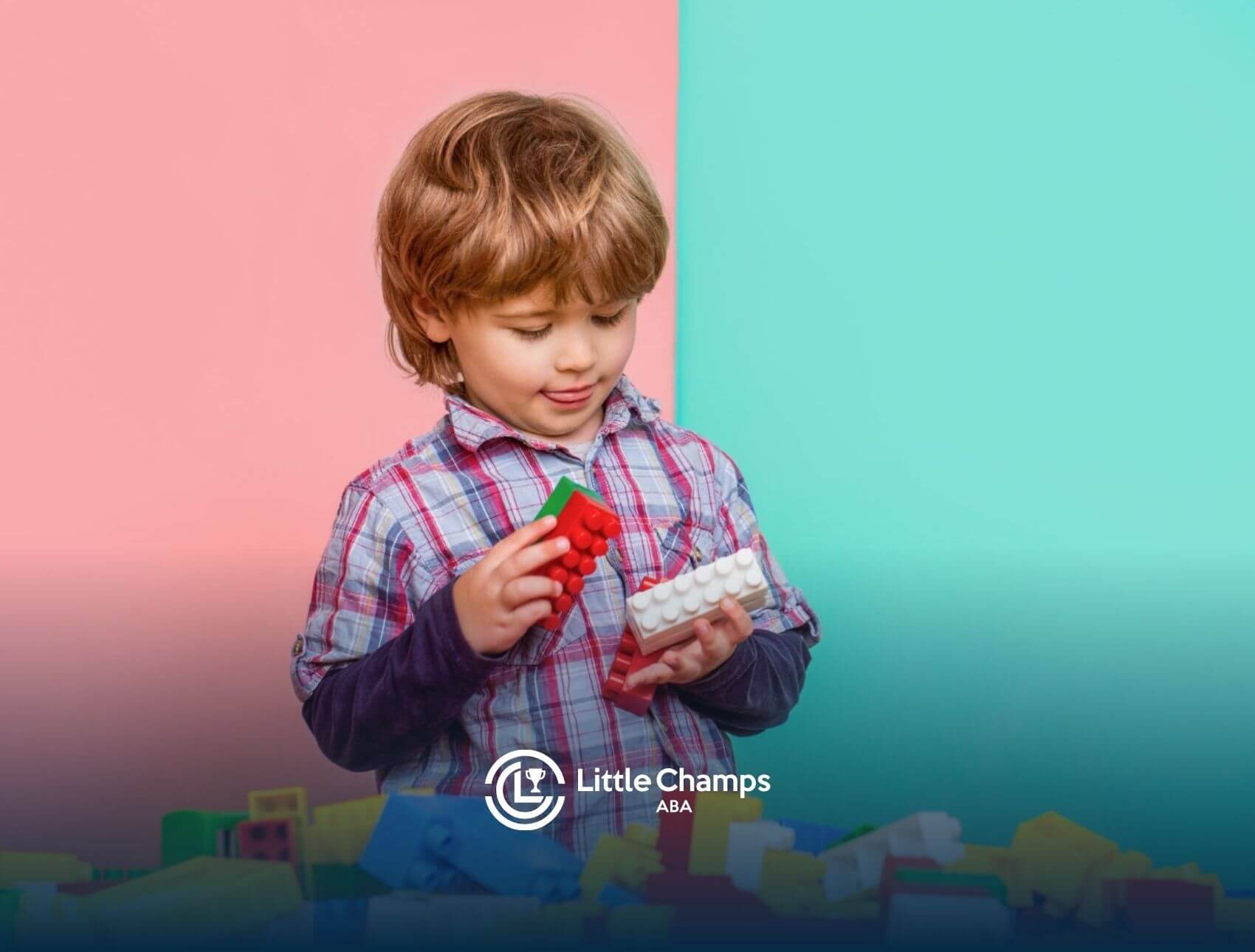 Child playing with colorful building blocks against pastel background in ABA therapy.