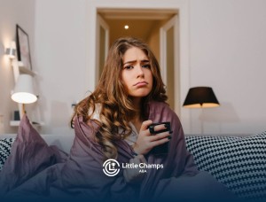 A young woman looking sad or overwhelmed.