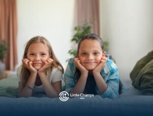 Two girls smiling together.
