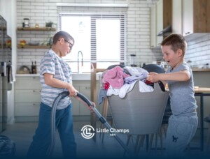 Two young boys with autism doing chores together in a modern kitchen.