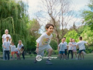 Autistic child running during an outdoor group activity.