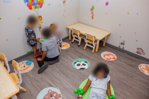 Children exploring a themed ABA therapy room in Cottonwood Heights.