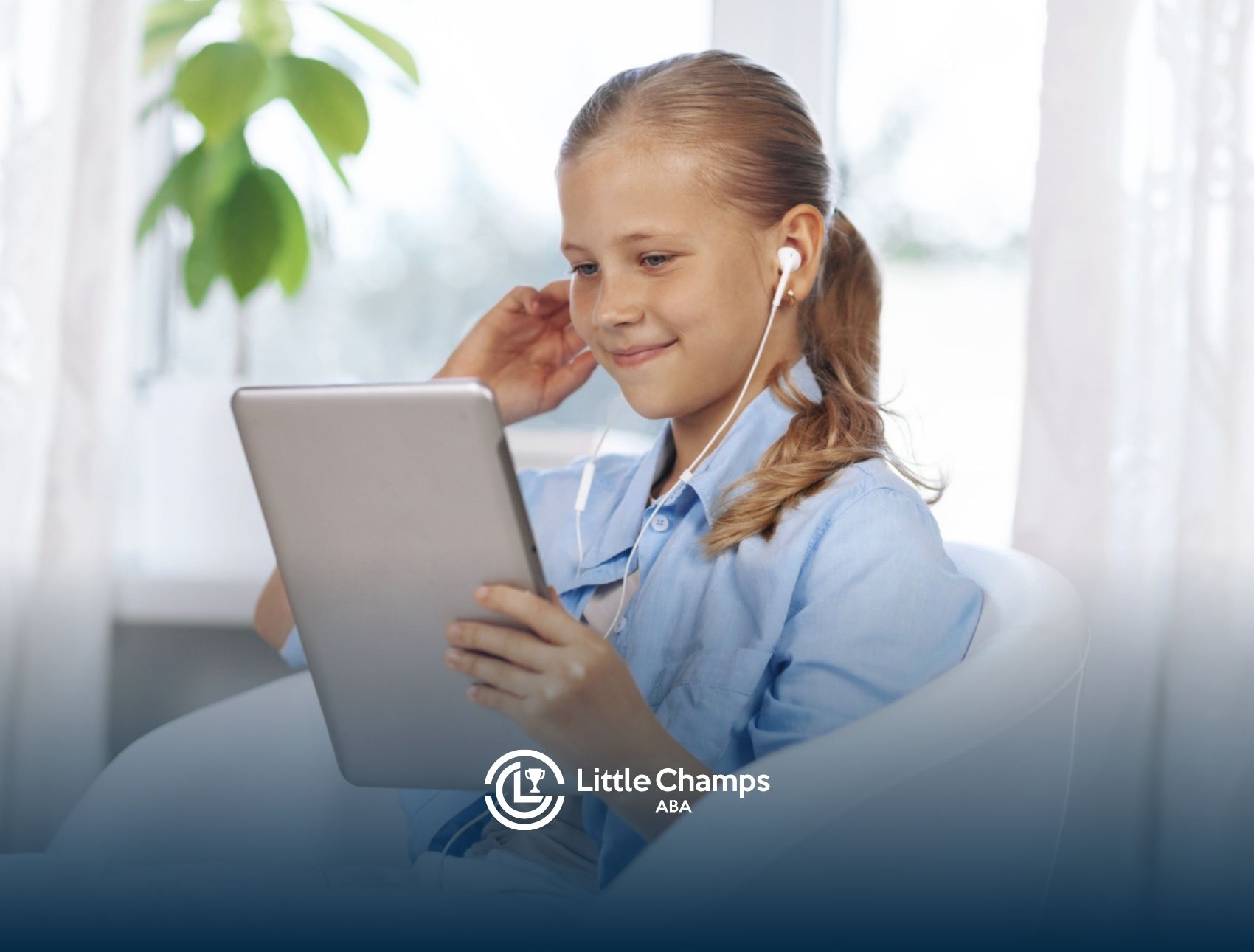 Autistic girl using a tablet and wearing earphones.