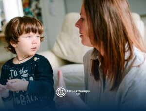 BCBA talking with a young child.