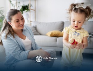 Young child practicing play skills with a therapist during ABA therapy to support generalization.