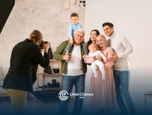 Family posing for a professional photo with young children.