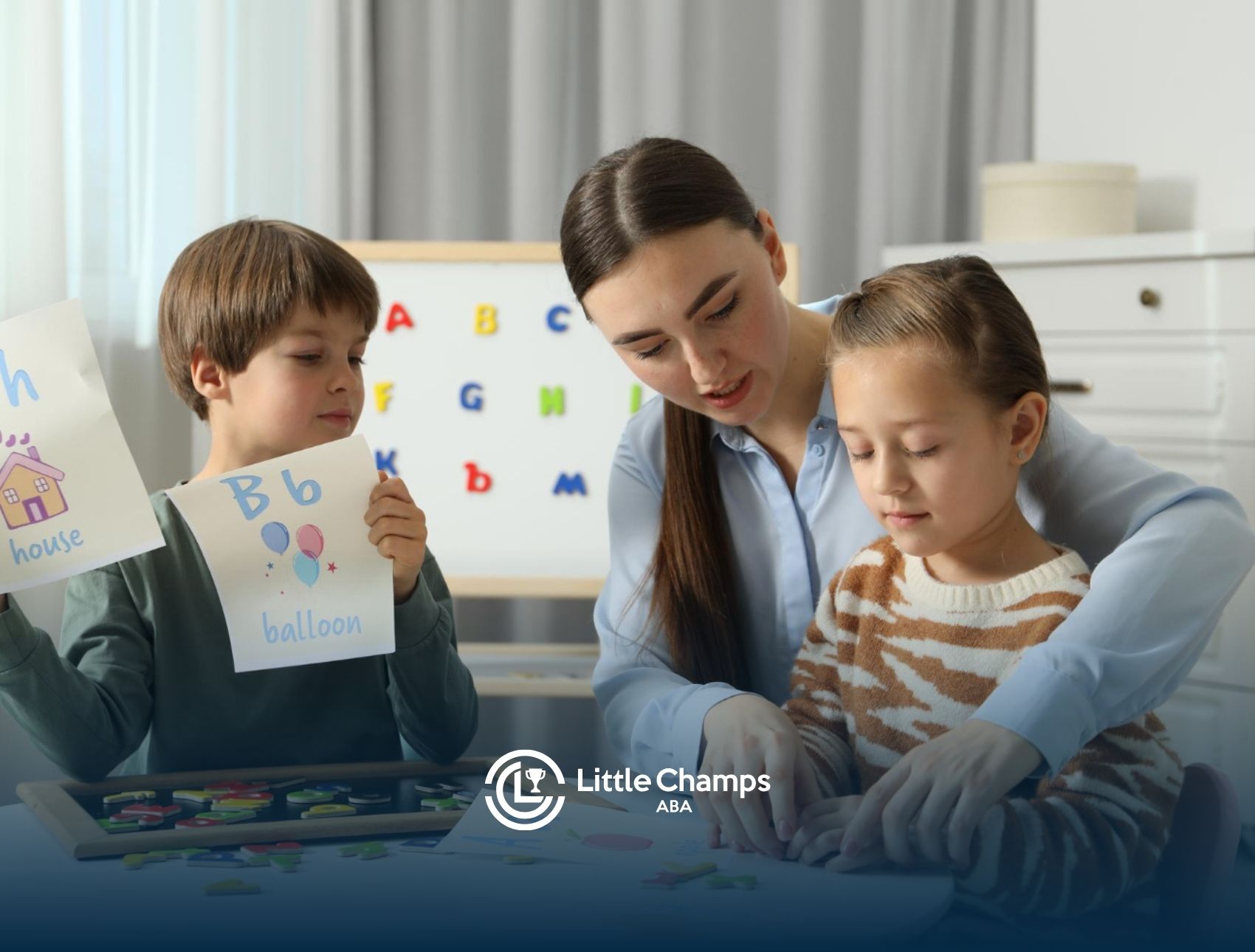 ABA therapist helping two children practice letter recognition and learning activities.